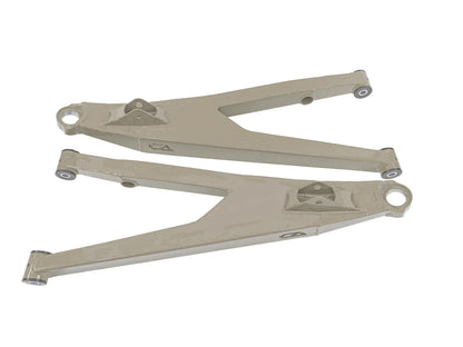 Can-Am Maverick X3 Upper Boxed Control Arms are laser cut from 4130 chromoly then CNC broke for quality and accuracy. Comes complete with 25% larger bushings installed to decrease wear and increase bushing life. Made with TIVARÃ‚Â® a high quality UHMW-PE material and is resistant to most all chemicals and conditions. 